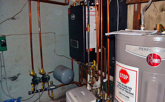 https://leeminghotwater.com.au/uploads/2025/06/electric-hot-water-system-58729.jpg
